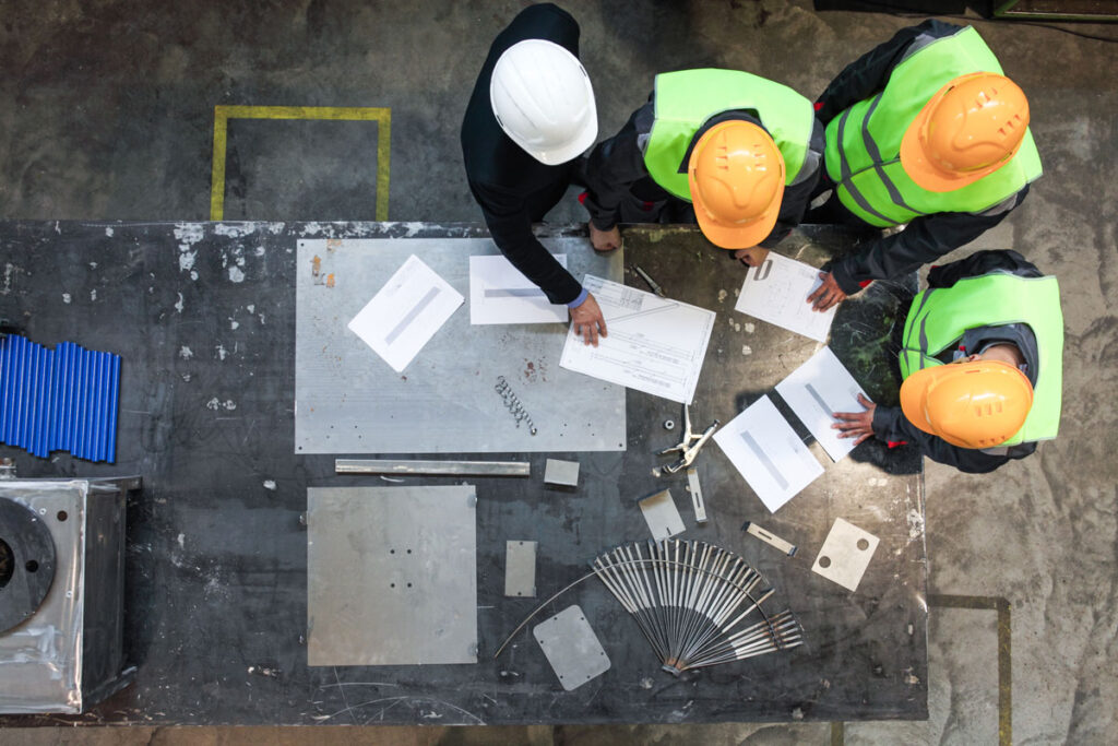 overhead of contractors working at a table