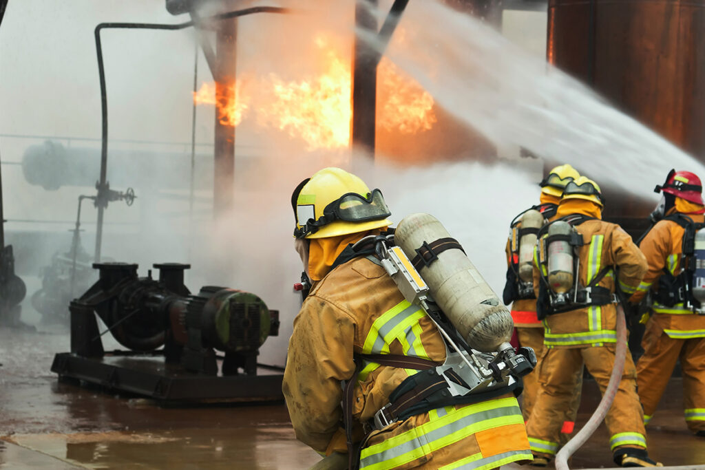 firefighters in action fighting blaze